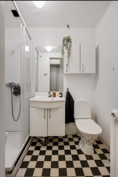 Badet med vaskemaskin.