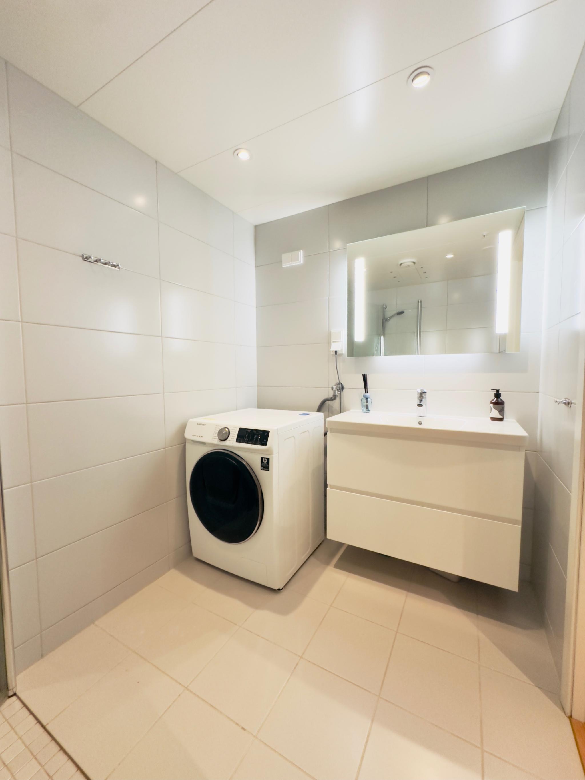 Badet med vaskemaskin 