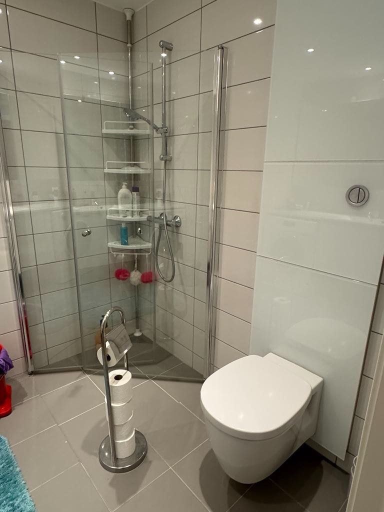 Dusj med innfellbare dører