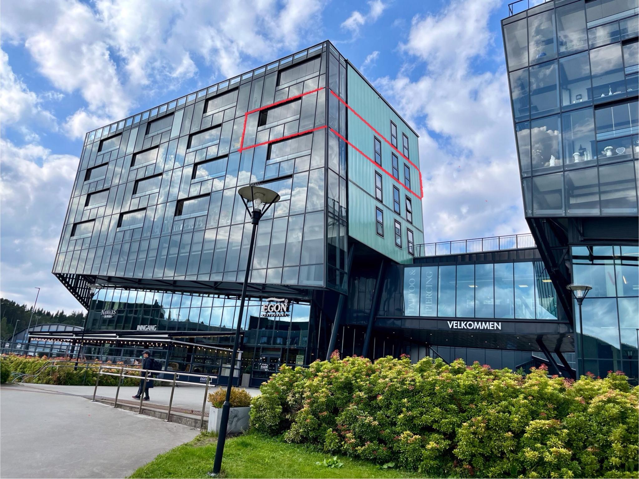 Fasade. Leiligheten er rammet inn med rødt