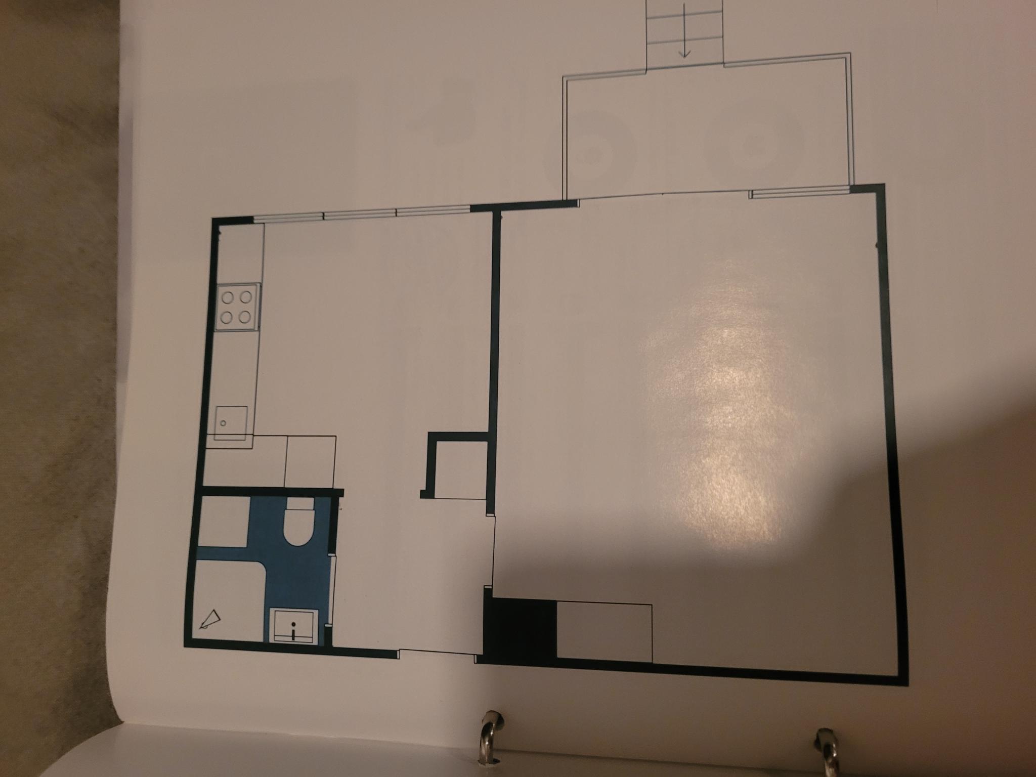 Planløsning før kjøkkenet ble flyttet til stua. Nå er soverommet øverst til høyre på bildet.