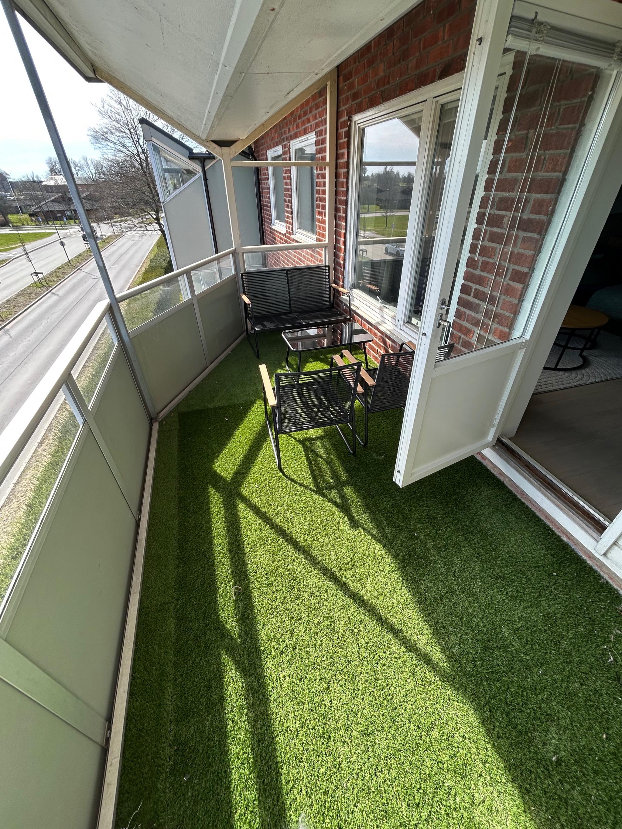 Balkong med morgensol