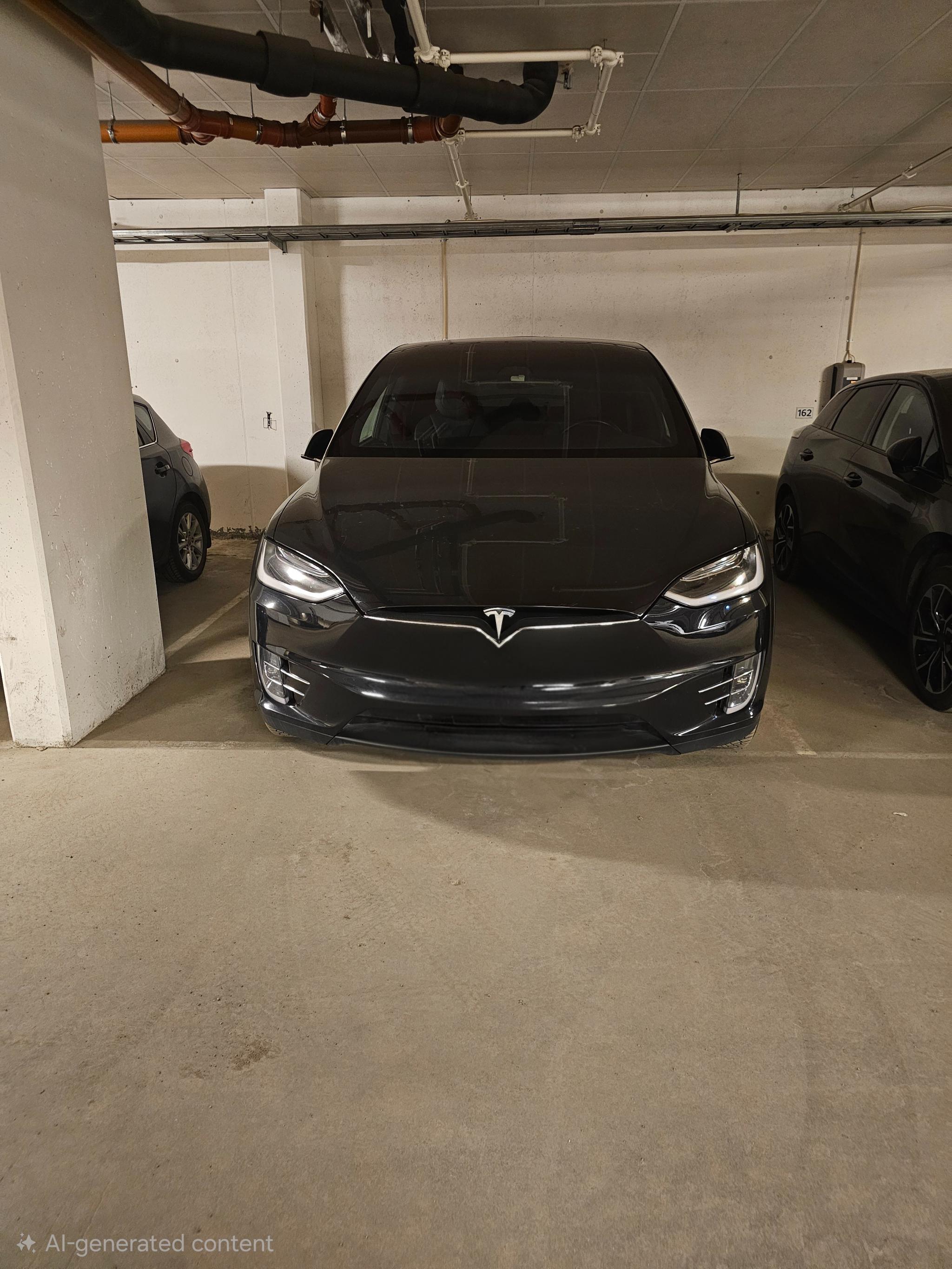 Bred parkeringsplass