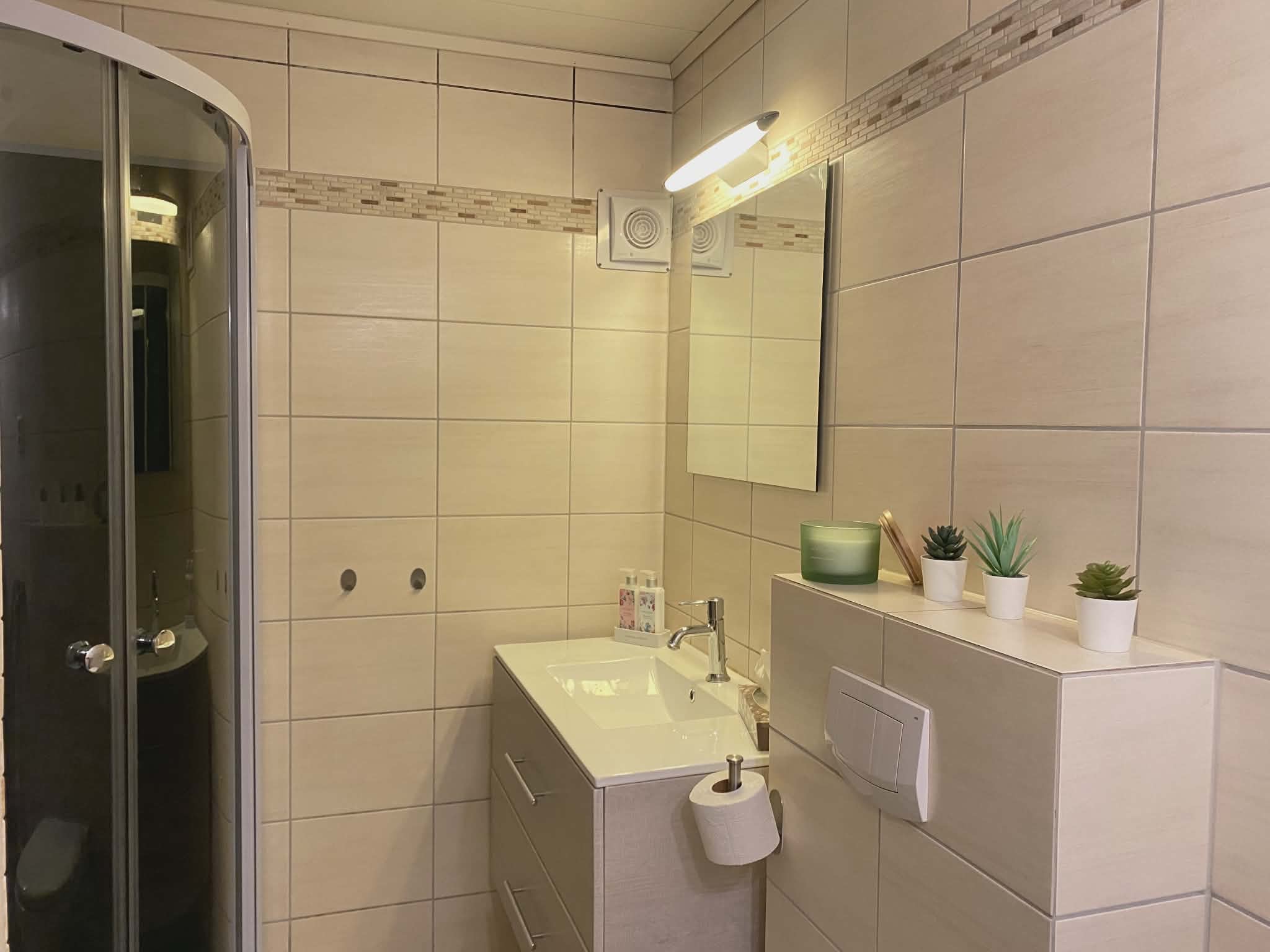Badet har også en vaskemaskin