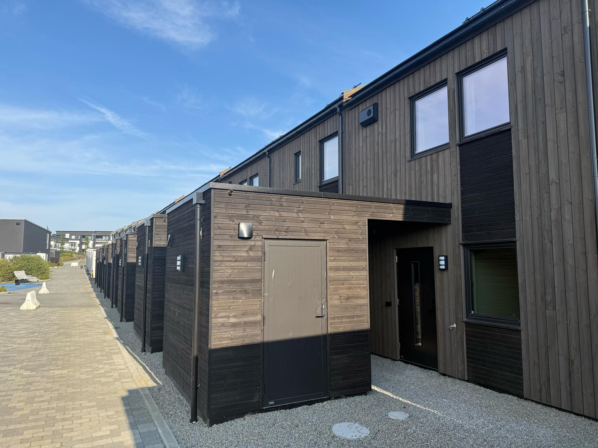 Overbygget inngangsport og sportsbod