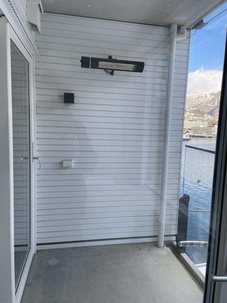 Terrasse med varmelampe